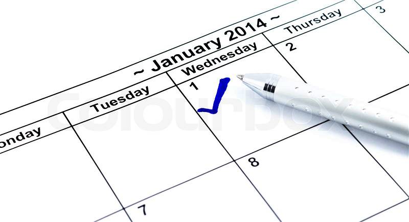 Blue check. Mark on the calendar at 1St January 2014 with pen, new year\'s day, stock photo