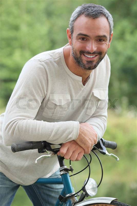 Man on bike ride, stock photo