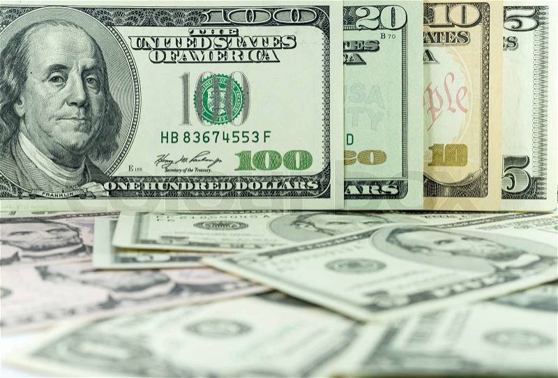 All stack type of american dollars on many dollars background, stock photo