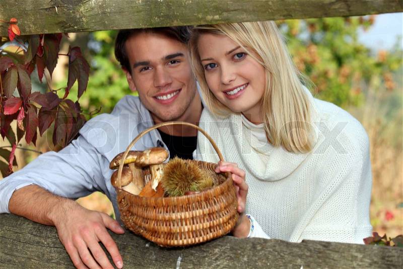 Duo behind a hedge, stock photo