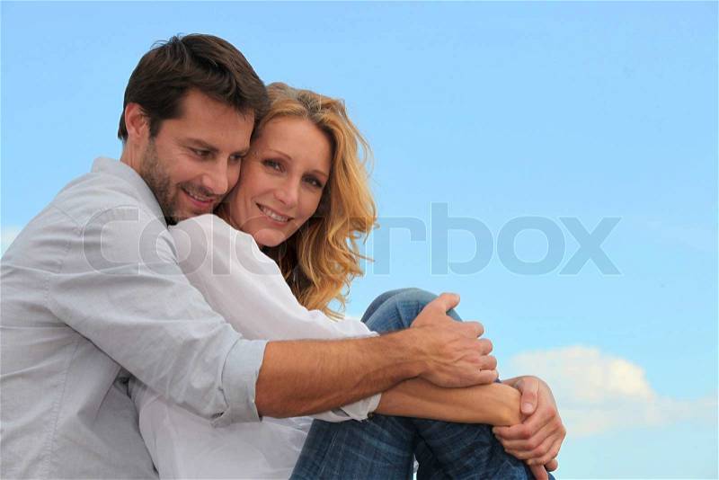 Couple hugging, stock photo