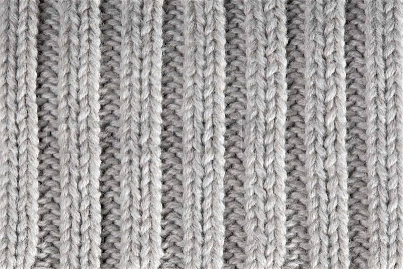 Gray knitted horizontal textured background , stock photo