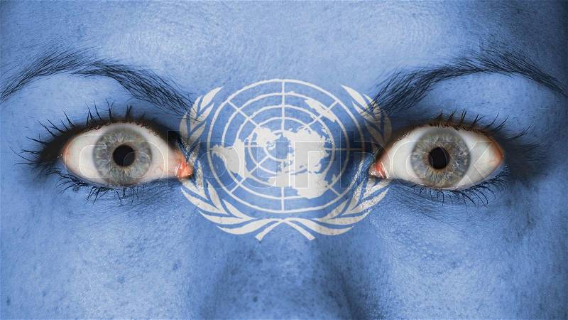 Close up of eyes. Painted face with flag of the United Nations, stock photo