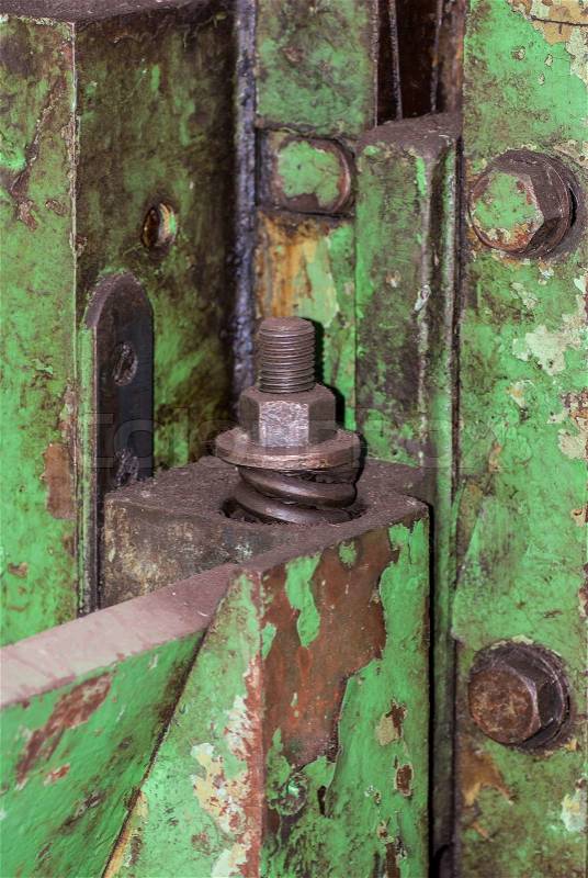 Old metal construction bonded bolts and nut, stock photo