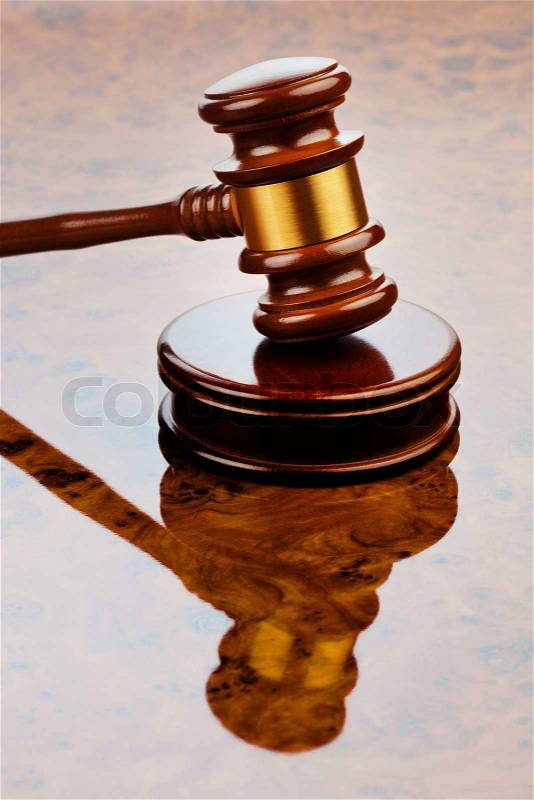 The judge hammer a judge in court. located on a desk, stock photo