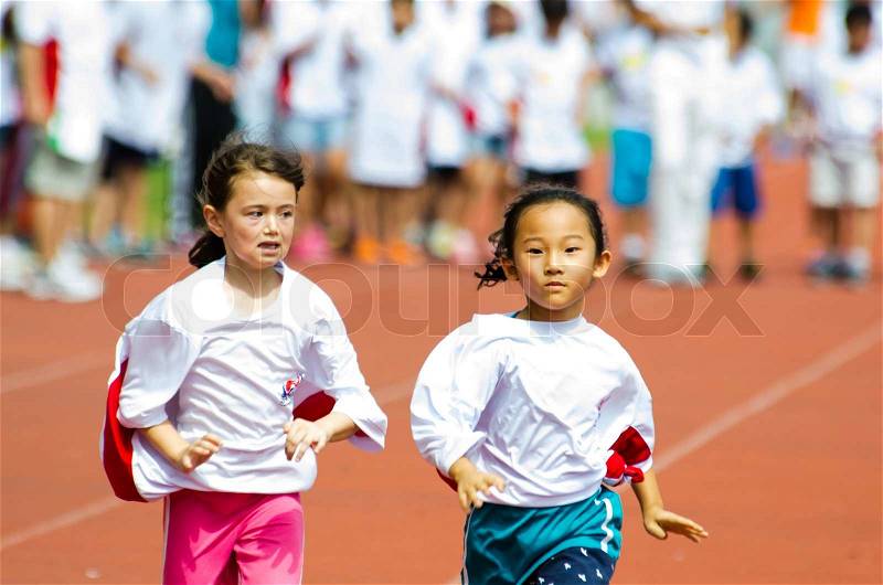 BANGKOK THAILAND - NOVEMBER 23: Unidentified athletes child at Hanmaeum International Sports Festival 2013 Korean Association of Thailand on November 23, 2013 in Bangkok, Thailand, stock photo