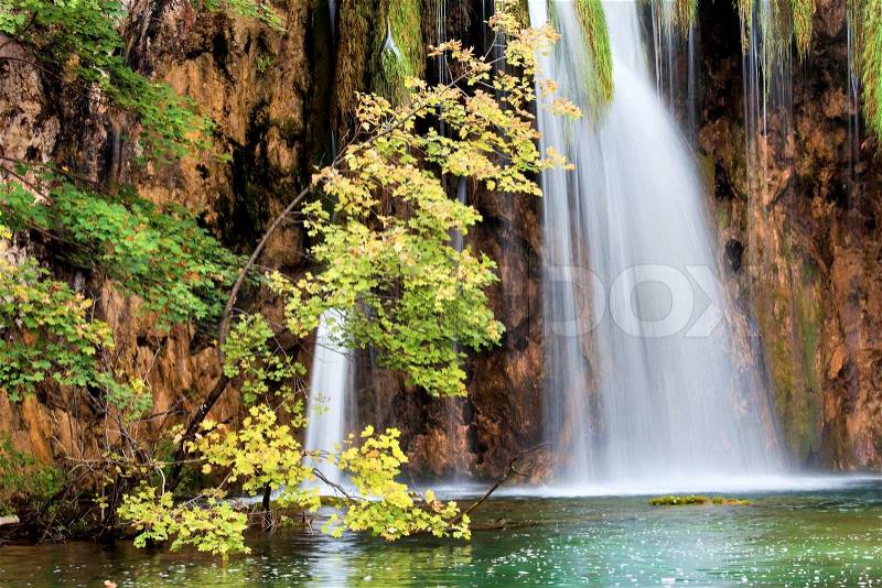 Scenic waterfall in the autumn mediterranean forest, stock photo
