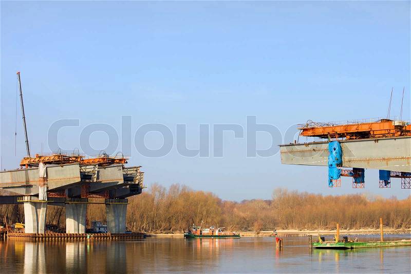 Construction site of the North Bridge in Warsaw, Poland. The bridge will consist of three parallel bridges, two for vehicles and one for trams, bicycles and pedestrians, stock photo