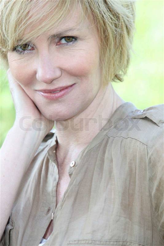 Woman with short blonde hair, stock photo