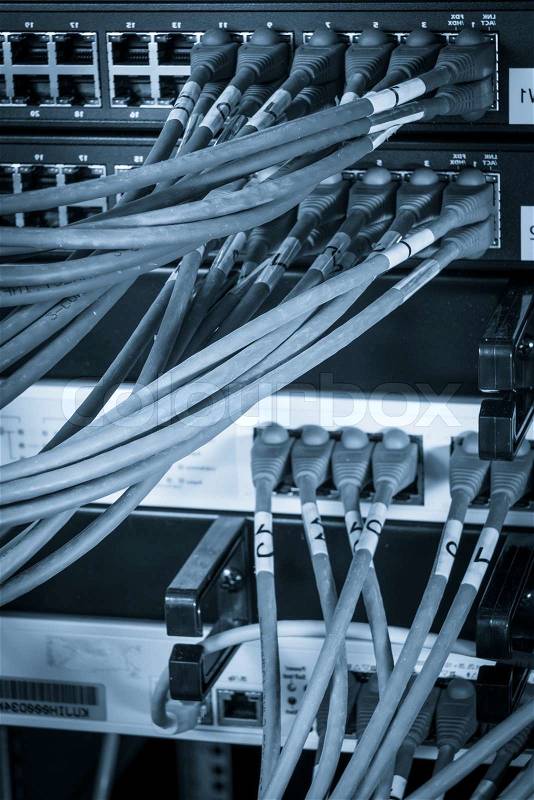 Close-up of network hub and ethernet cables, stock photo