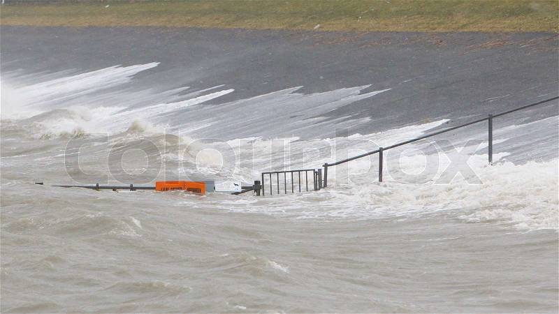 Extreme high tide at the dikes of the dutch coastal works, stock photo