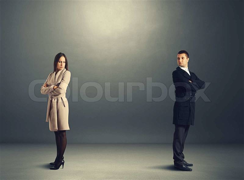 Sorrowful man and woman in quarrel, stock photo