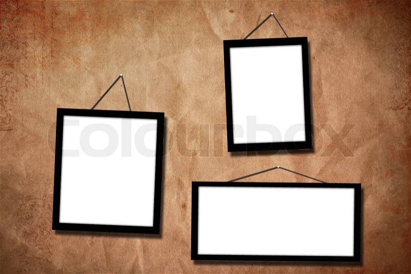 Picture frame on wall to put your own pictures in, stock photo