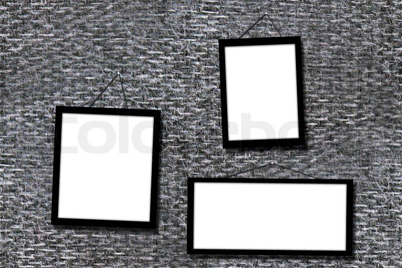 Picture frame on wall to put your own pictures in, stock photo