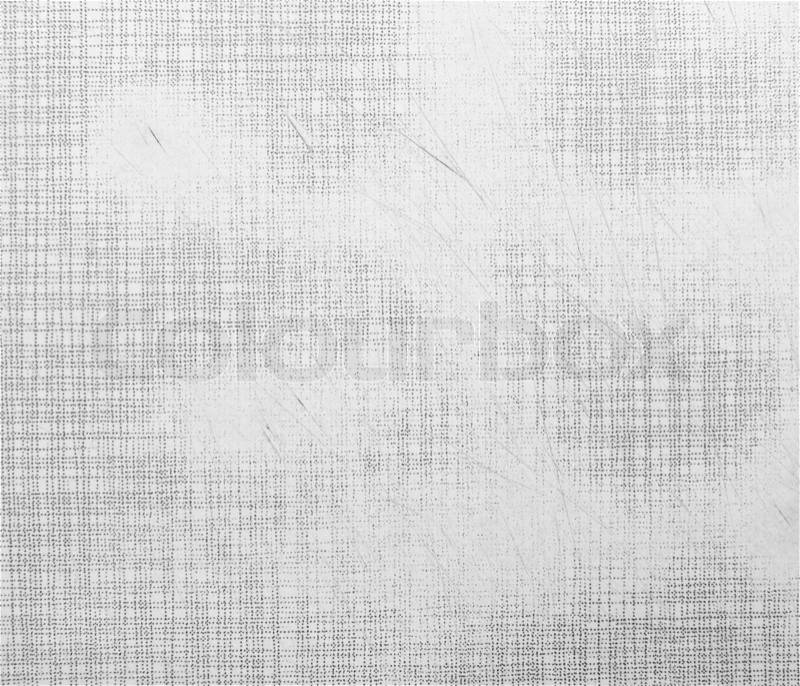 Old scratched plastic board. Grey background, stock photo