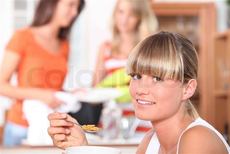 Friends eating breakfast, stock photo