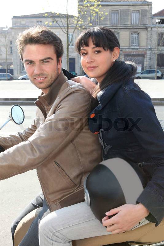Couple on a motorcycle, stock photo