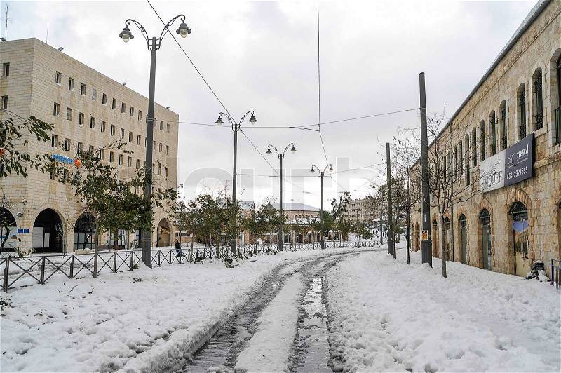Railways of Jerusalem tram covered in snow, December 13,2013, stock photo