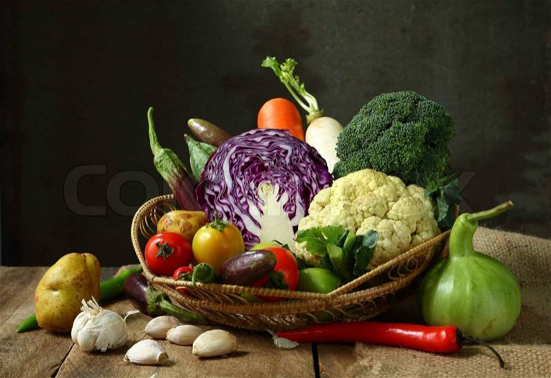 Still life harvested vegetables agricultural on wooden background, stock photo
