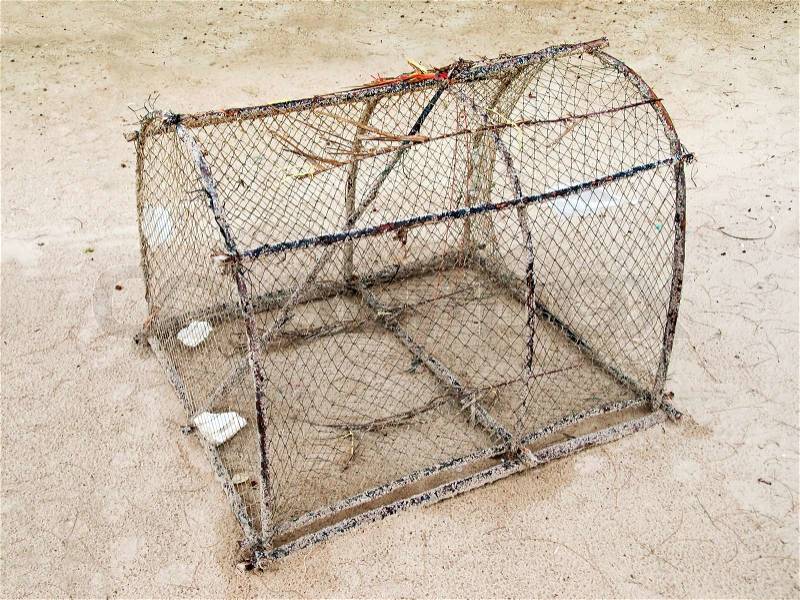 Basket fish trap catch crab and fish, stock photo