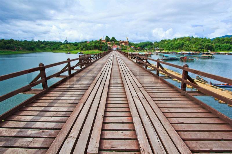 The old wooden bridge Bridge across the river and Wood bridge (Mon bridge )at sangklaburi, kanchanaburi, Province Asia thailand, stock photo