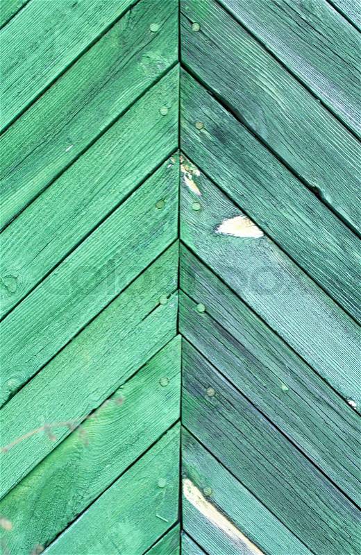 Wooden background is painted in green paint, stock photo