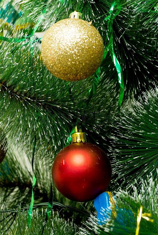 Artificial green Christmas tree with round balls, great christmas background, stock photo