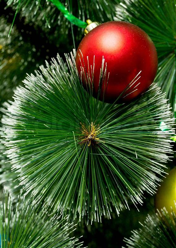 Artificial green Christmas tree with round balls, great christmas background, stock photo