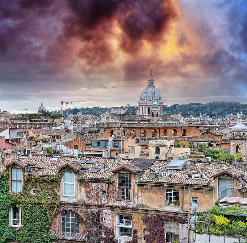 Wonderful view of Rome at sunset with St Peter Cathedral, stock photo