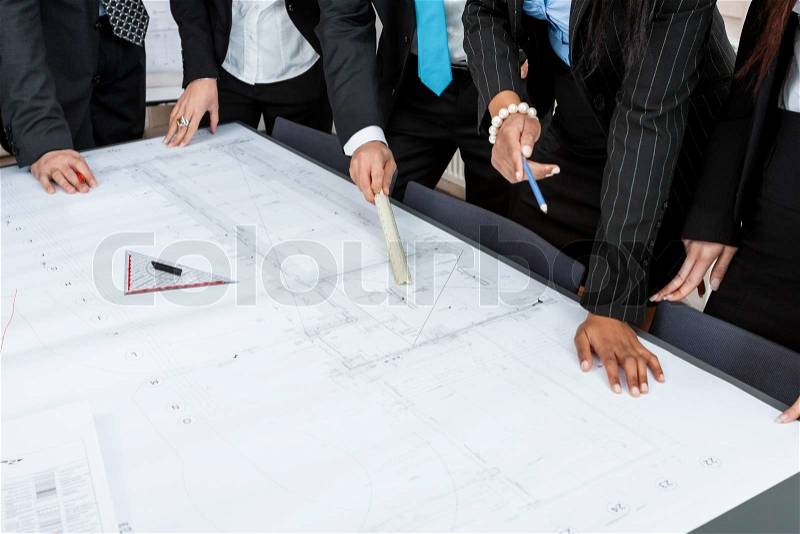 Business people team in office presentation plan blueprint , stock photo