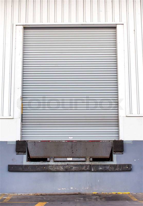 Shutter door, outside of factory, stock photo