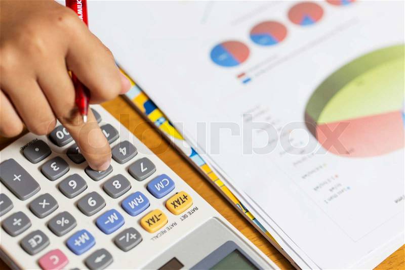 Finance budget report with hand of someone, stock photo