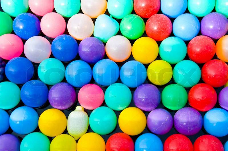 Colorful of small ball in water, stock photo