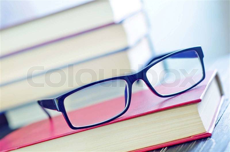 Glasses and books, stock photo