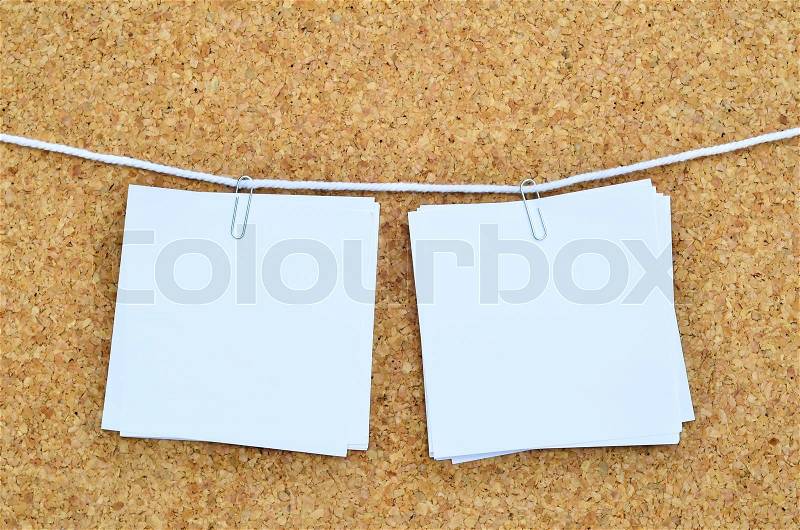 White Note Paper Isolate On Cork Background, stock photo