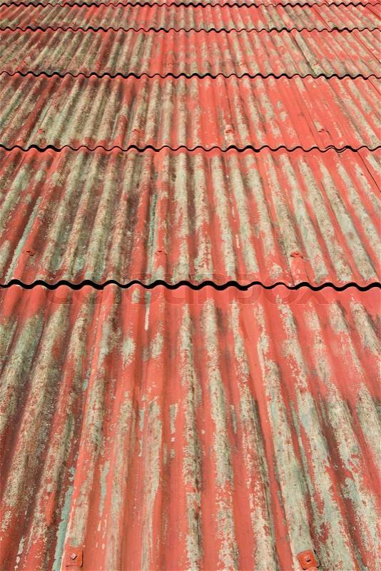 Old red roof tiles , background of old roof , stock photo