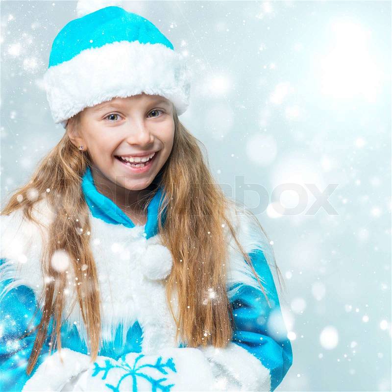 Cute little girl in suit Snow Maiden, stock photo