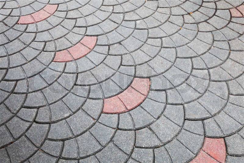 Urban road pavement pattern with red details, stock photo