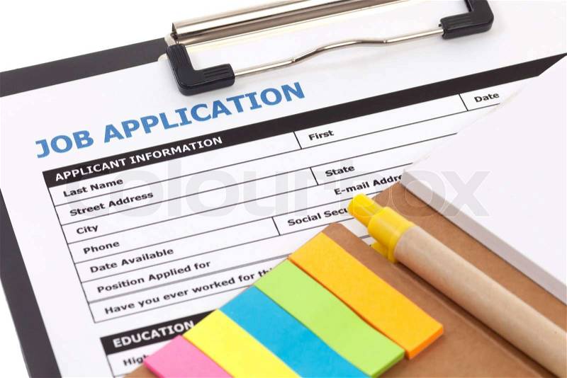 Job application form with notepad, stock photo