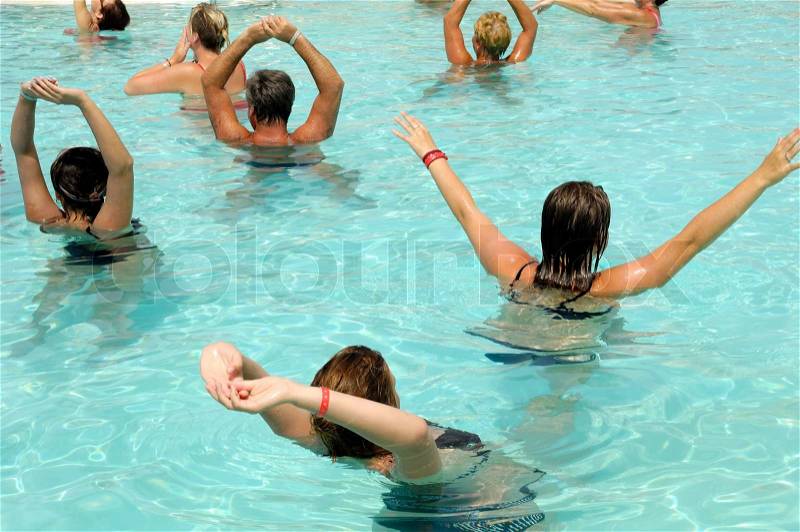 People are doing aerobic in pool, stock photo