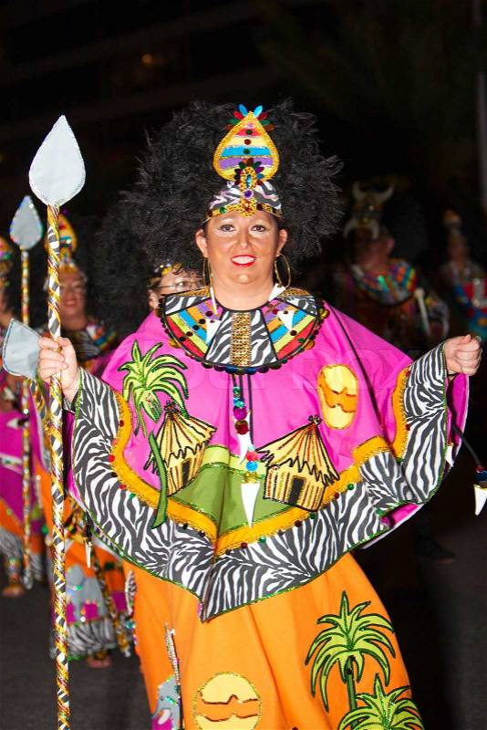 LANZAROTE, SPAIN - Feb, 20: Man in Carnival costumes at the Grand Carnival Parade on February 20, 2012 in Arrecife, Lanzarote, Canaries Islands, Spain, stock photo