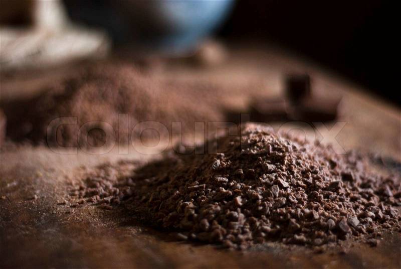 Chocolate for making truffles ganache, finely chopped to a powder, stock photo