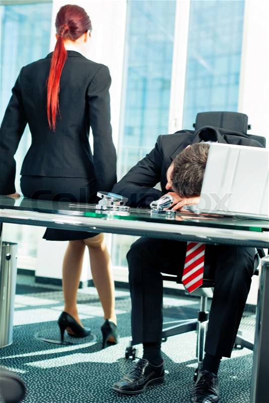 Business - nap in the office to relieve stress, stock photo