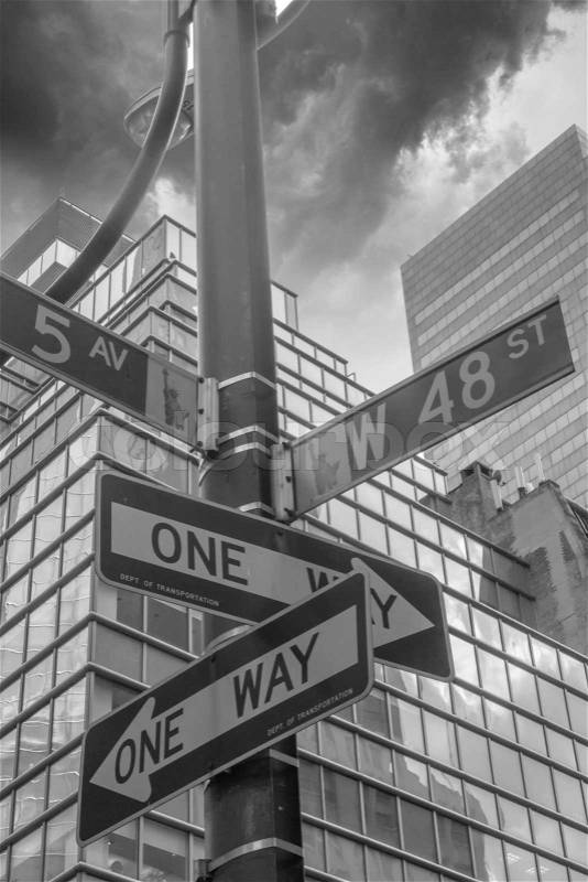 Street signs indicating Roads intersection, Manhattan New York City, stock photo