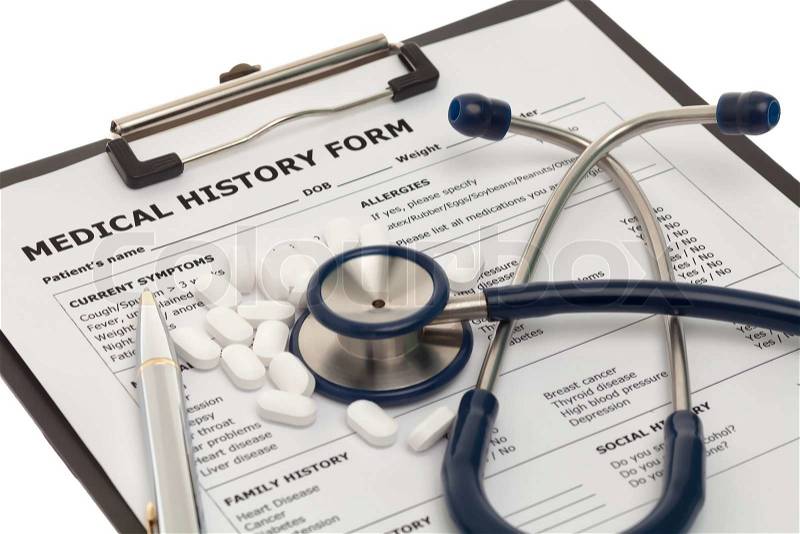 Patient medical history document with pills and stethoscope, stock photo