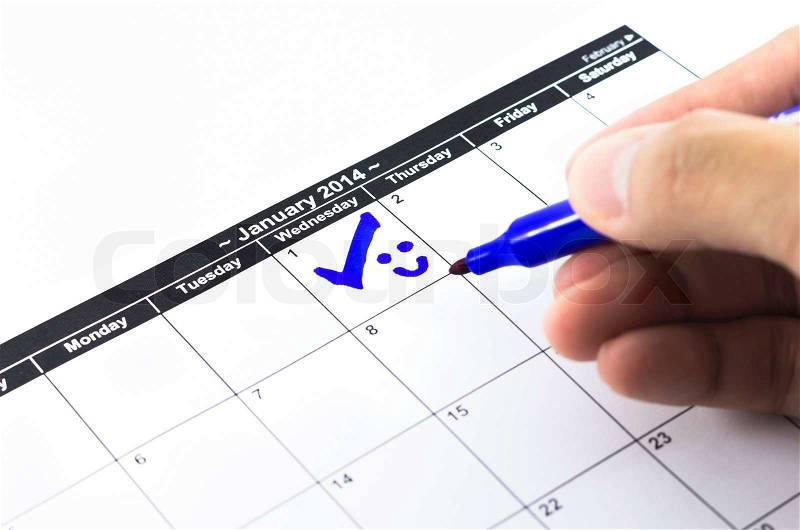 Blue check with smile. Mark on the calendar at 1St January 2014, stock photo