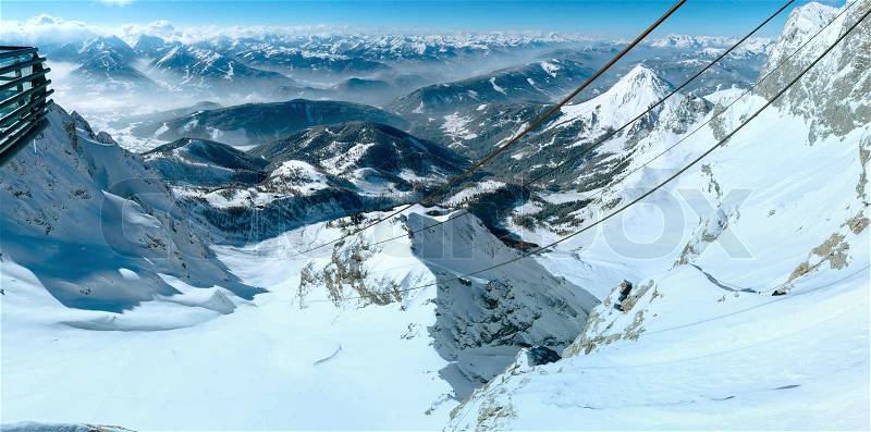 Winter hazy mountain view from upper station cable car to Dachstein (Austria), stock photo
