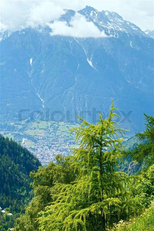 Summer mountain landscape with snow on mount top (Alps, Switzerland), stock photo