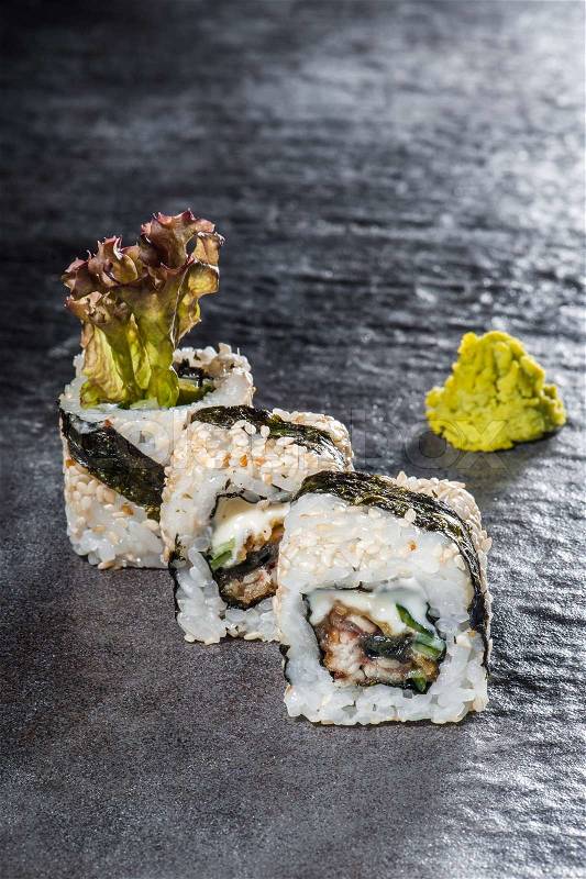 Unagi Onigara - traditional sushi with tempura ell, cucumber and cheese, stock photo