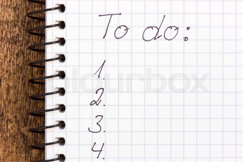 To do list on a notepad, to get things done and be productive, stock photo